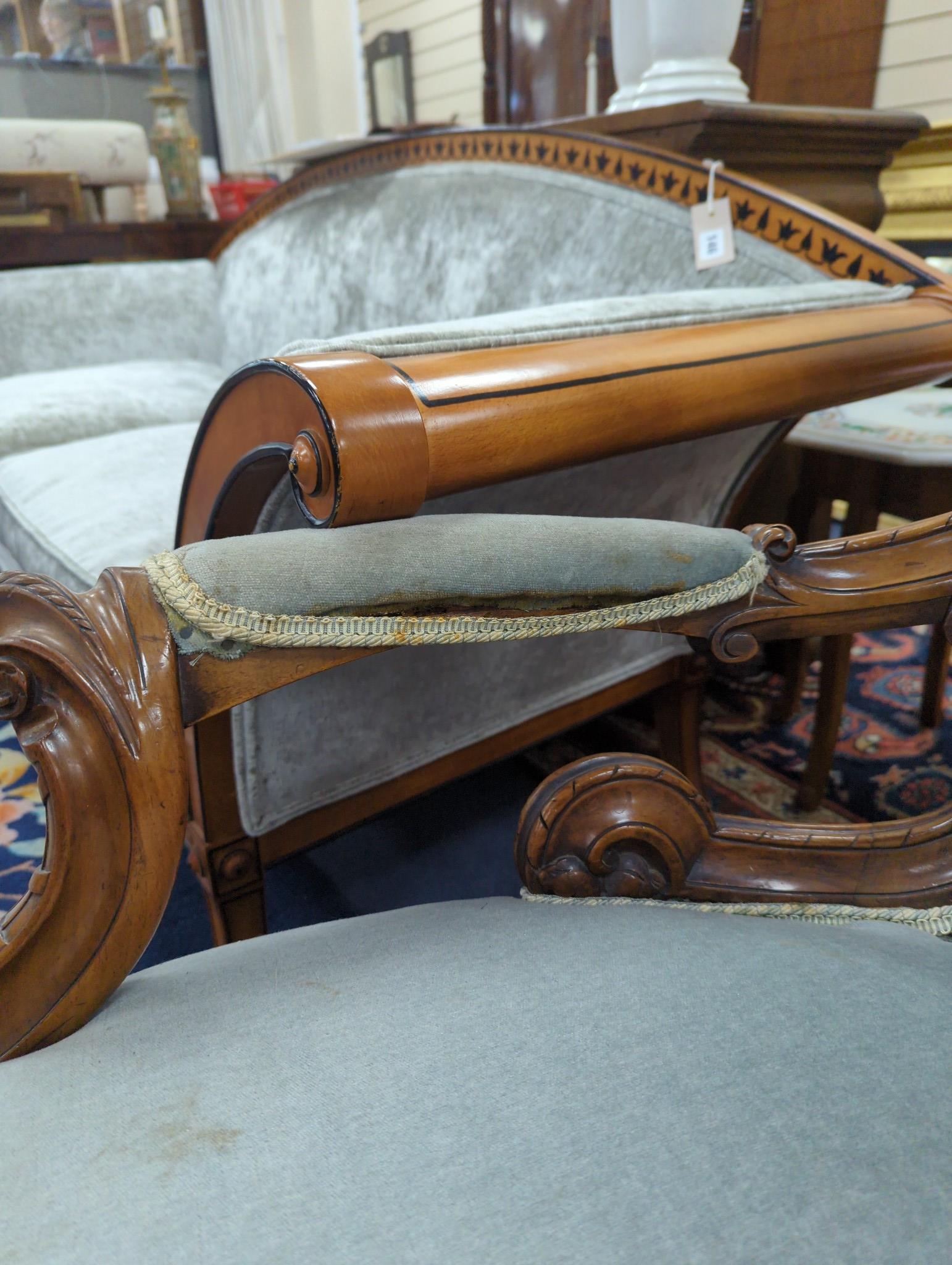 A Victorian carved walnut upholstered open armchair, width 68cm, depth 60cm, height 103cm